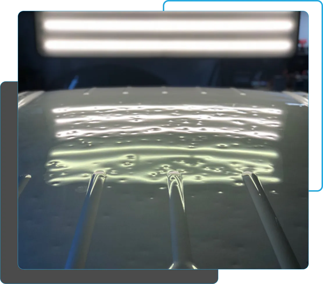 automotive hail repair, PDR on the roof of a vehicle