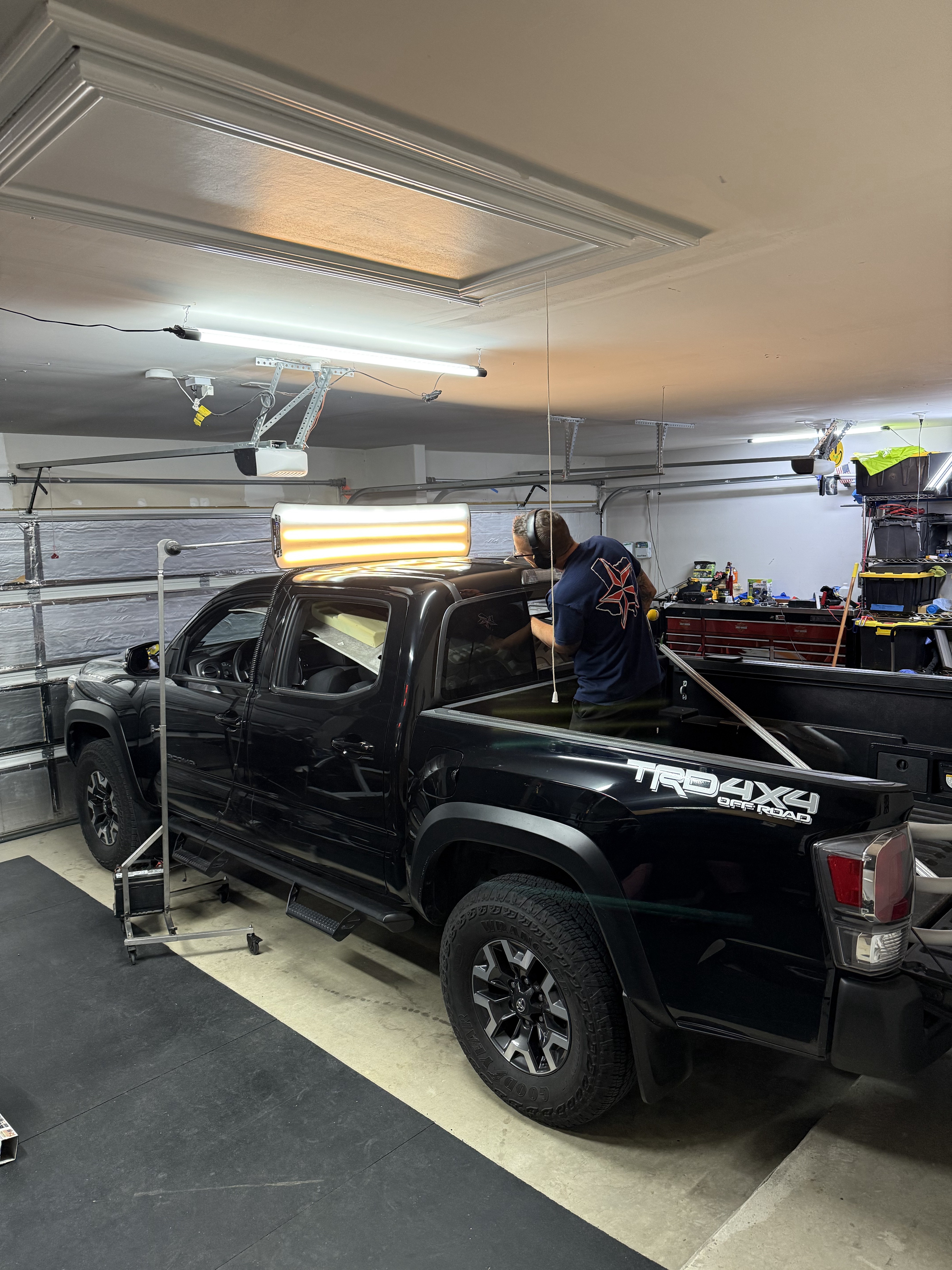 automotive hail repair, PDR on the roof of a vehicle