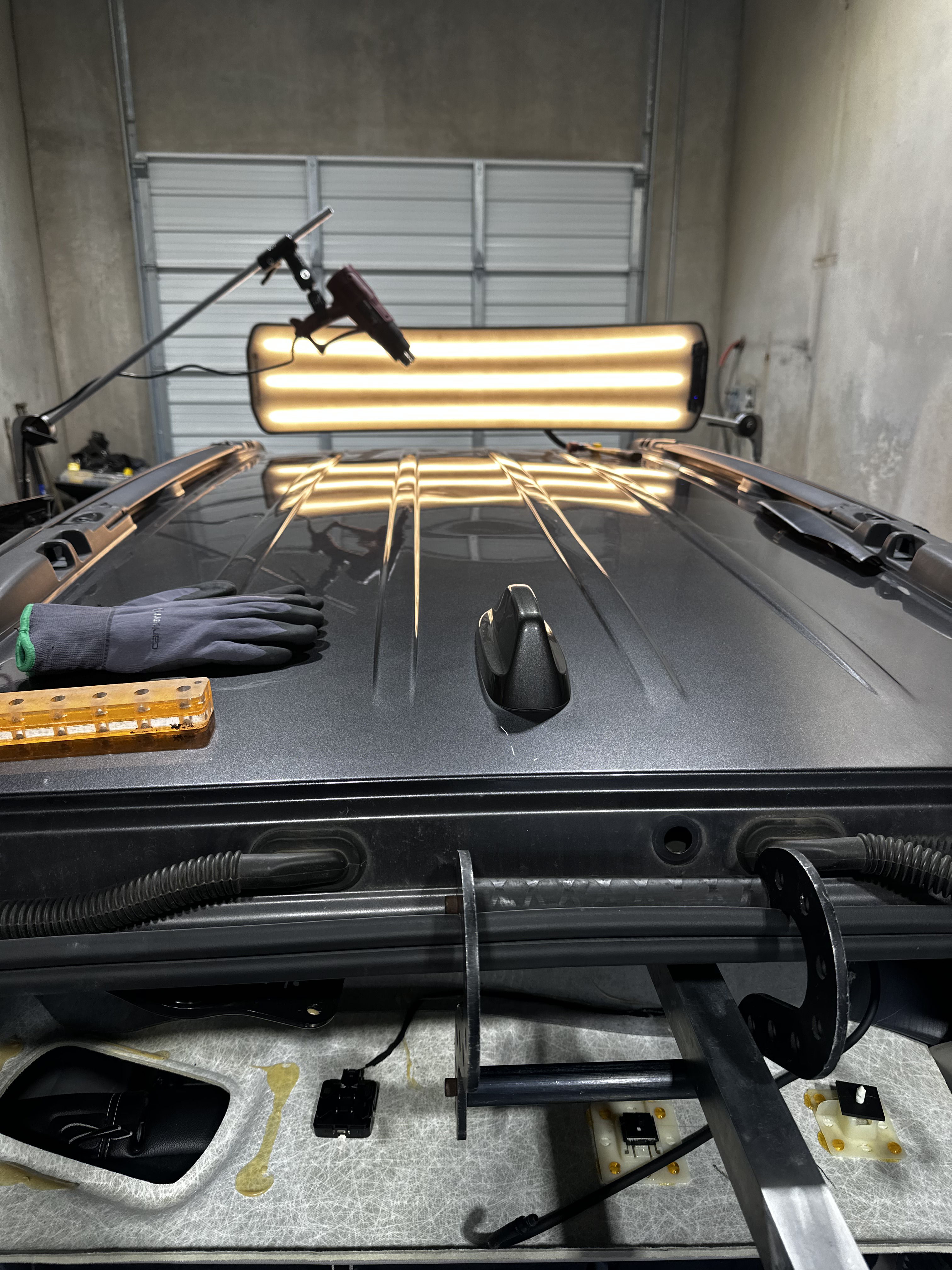 mobile paintless dent repair technician in action