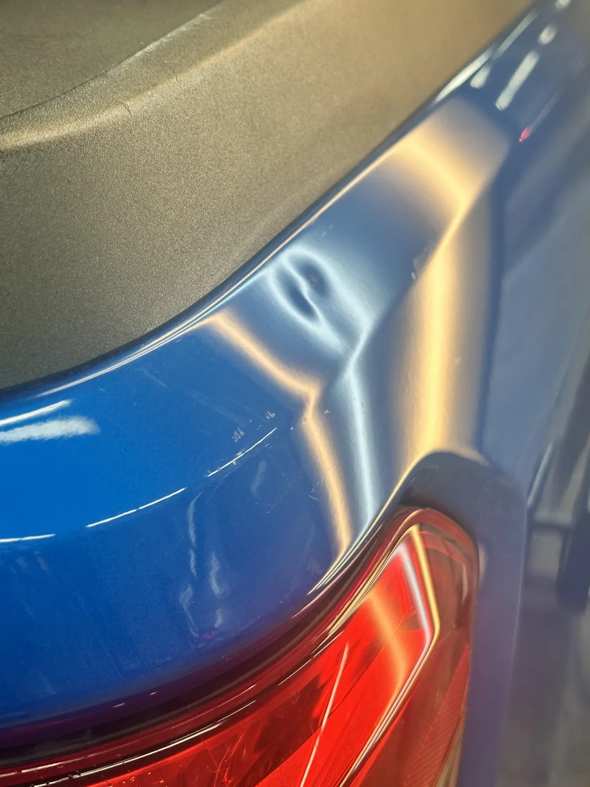 pdr technician repairing door dings