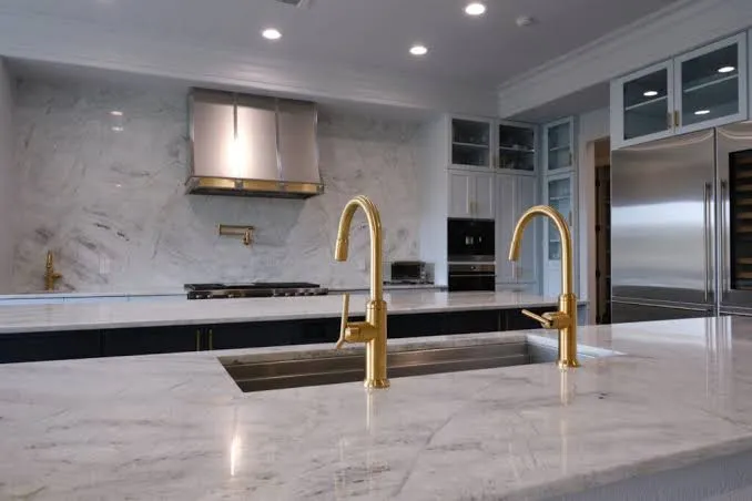 Freehold Kitchen & Bath Remodel team designing an open-concept kitchen with elegant lighting and island seating