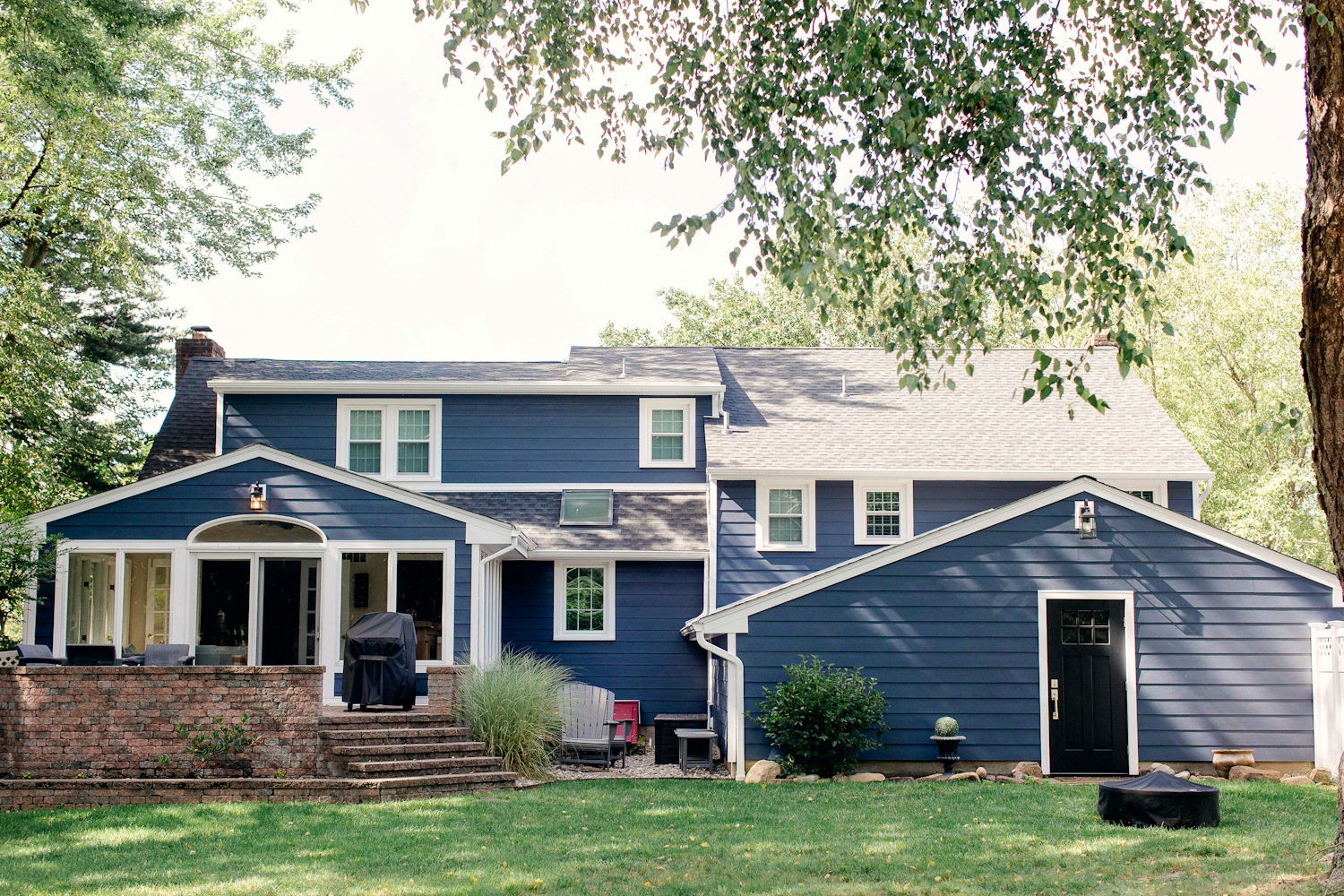 Two triangular dormer windows on a tiled roof.