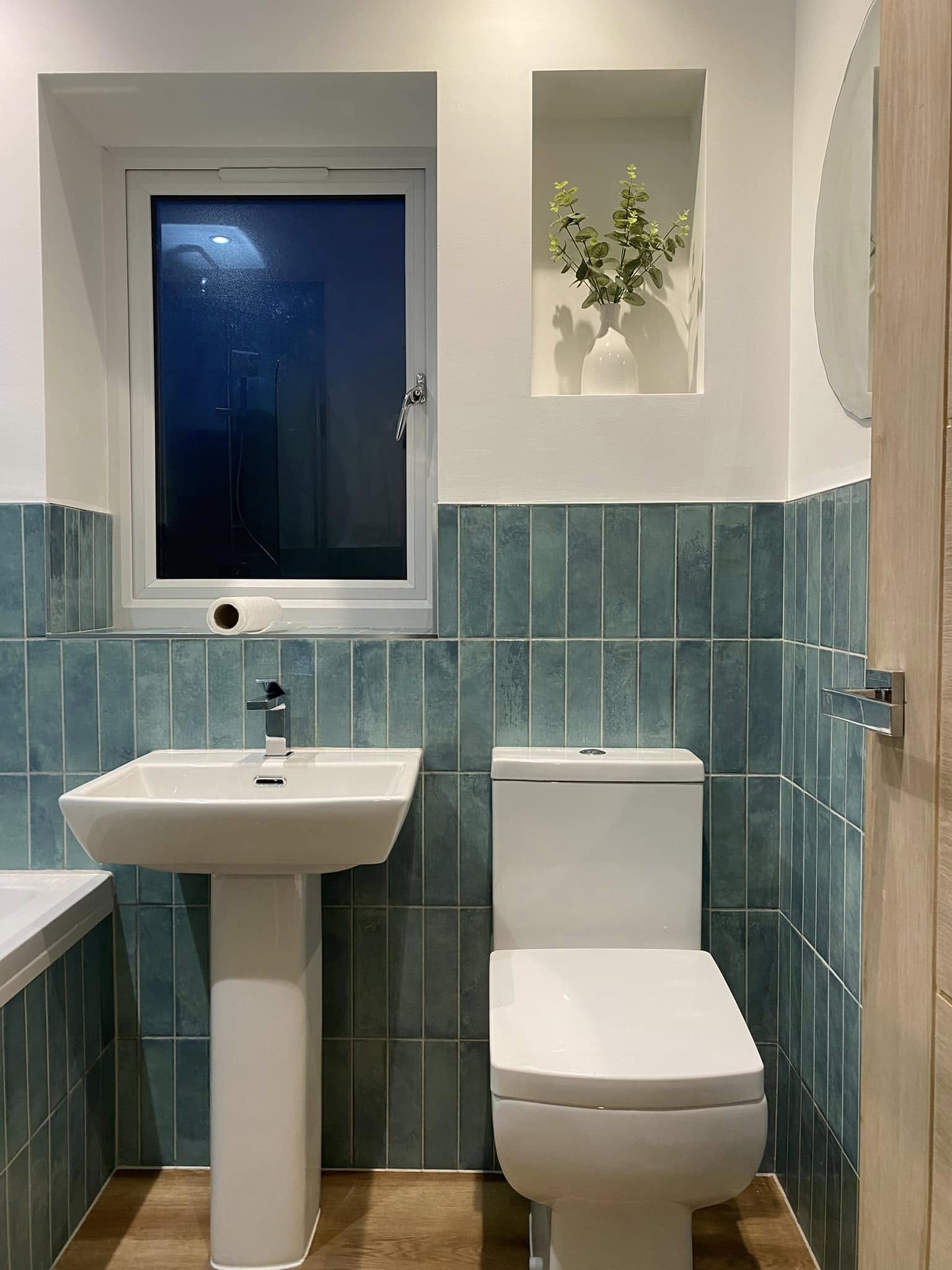 tiled bathroom in Dundee with green tiles and full decoration.jpg