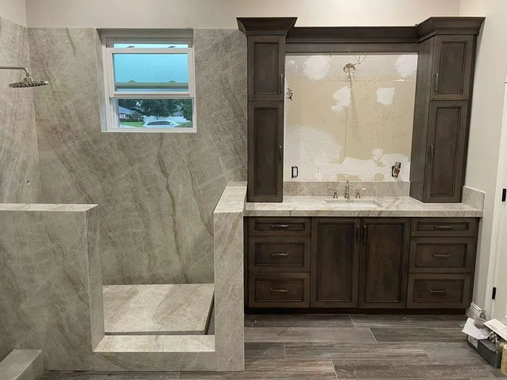 person holding orange flower petals