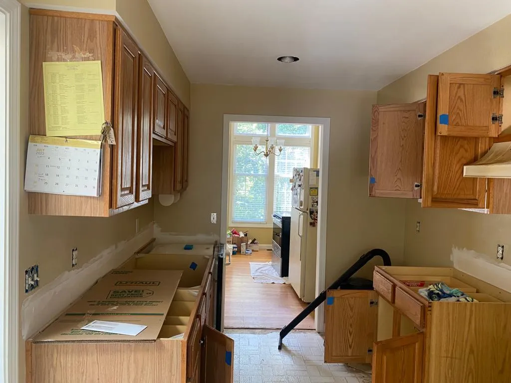 man holding incandescent bulb