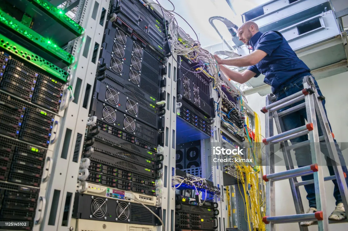 Technician wearing white gloves replacing smartphone screen on a repair workstation in Hawaii