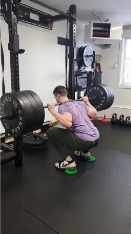 Coach Ethan demonstrating a back squat at HFS Life