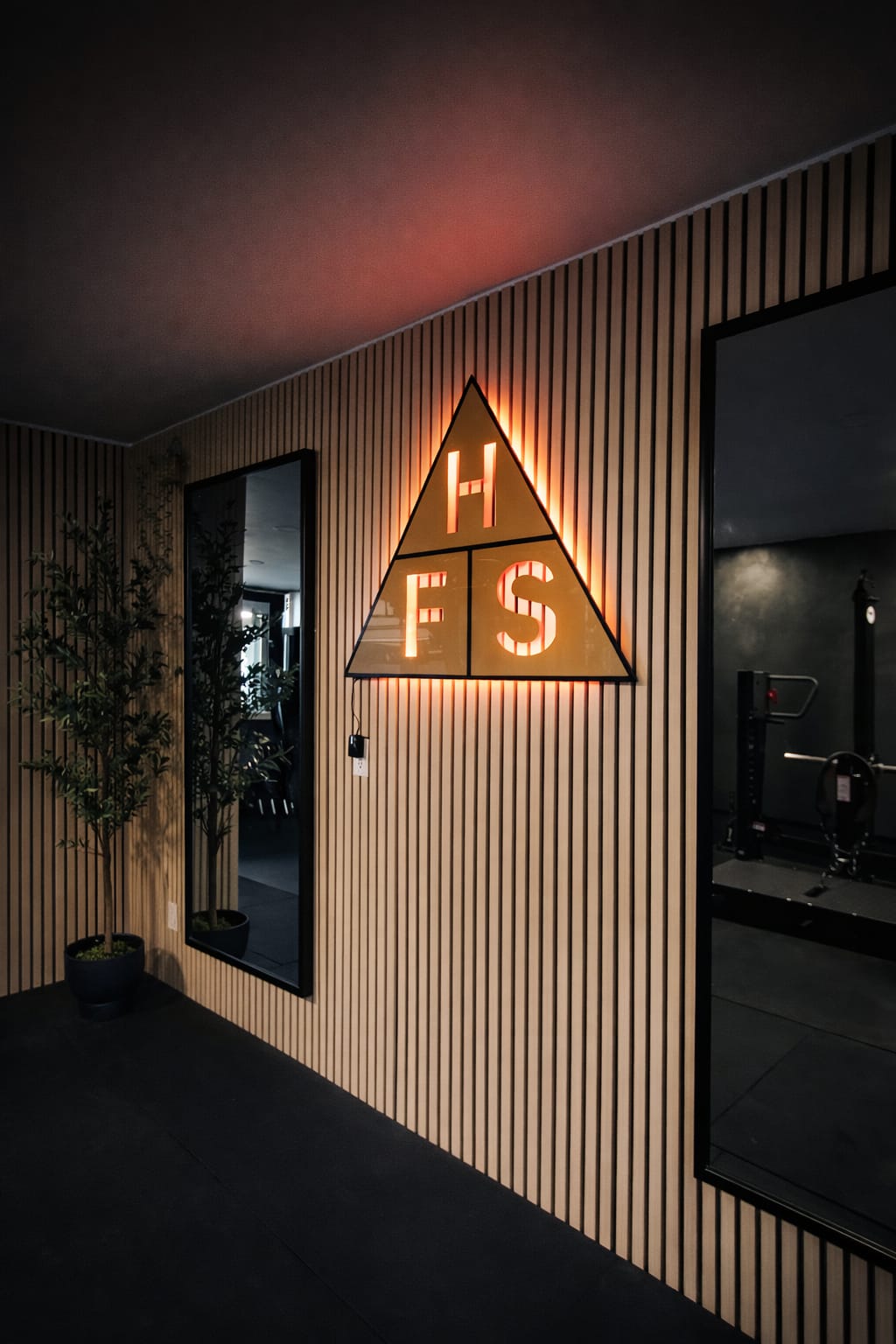 Coach Ethan is performing a women's group fitness class at HFS life.