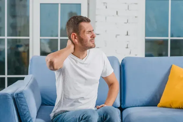 man with neck pain