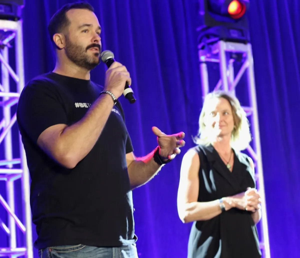 Anthony Michael Russo, Founder of Double Down Strategy on stage speaking to an audience in 2022