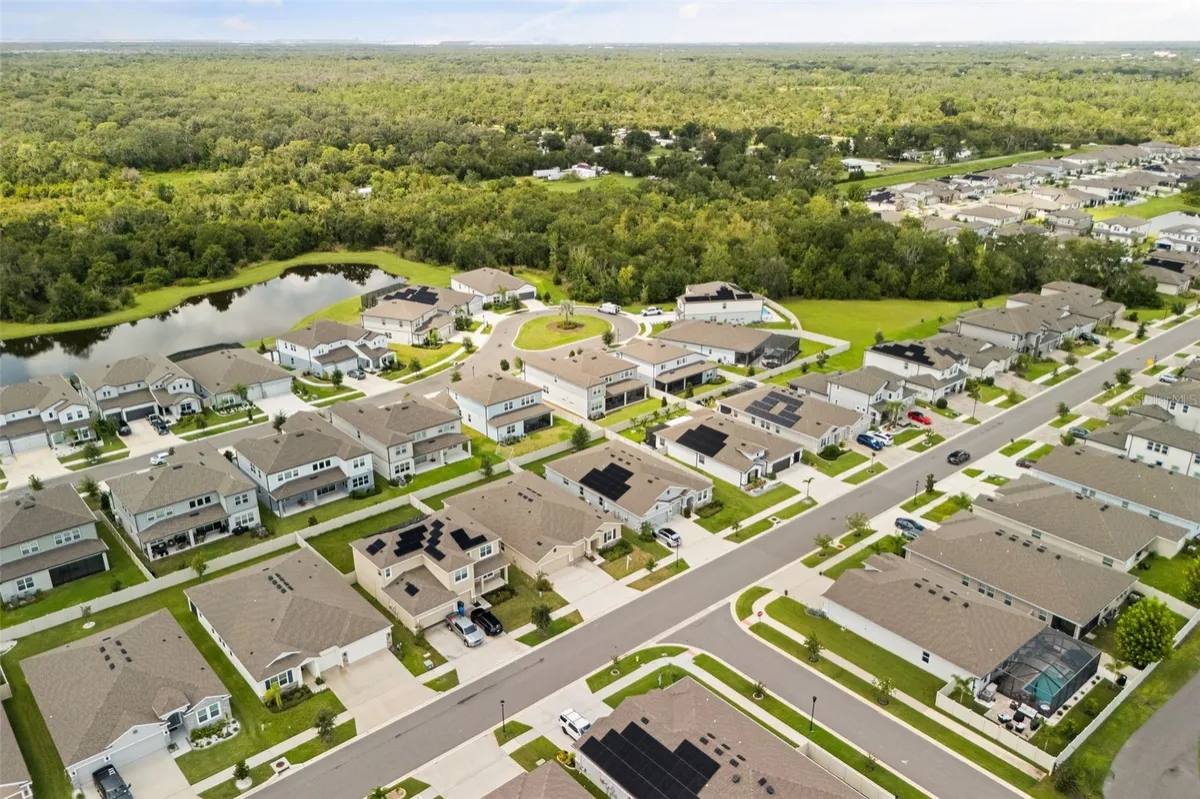 Aerial listing photograph showing the Cedarbrook neighborhood around Shining Willow Street. This is a community view.