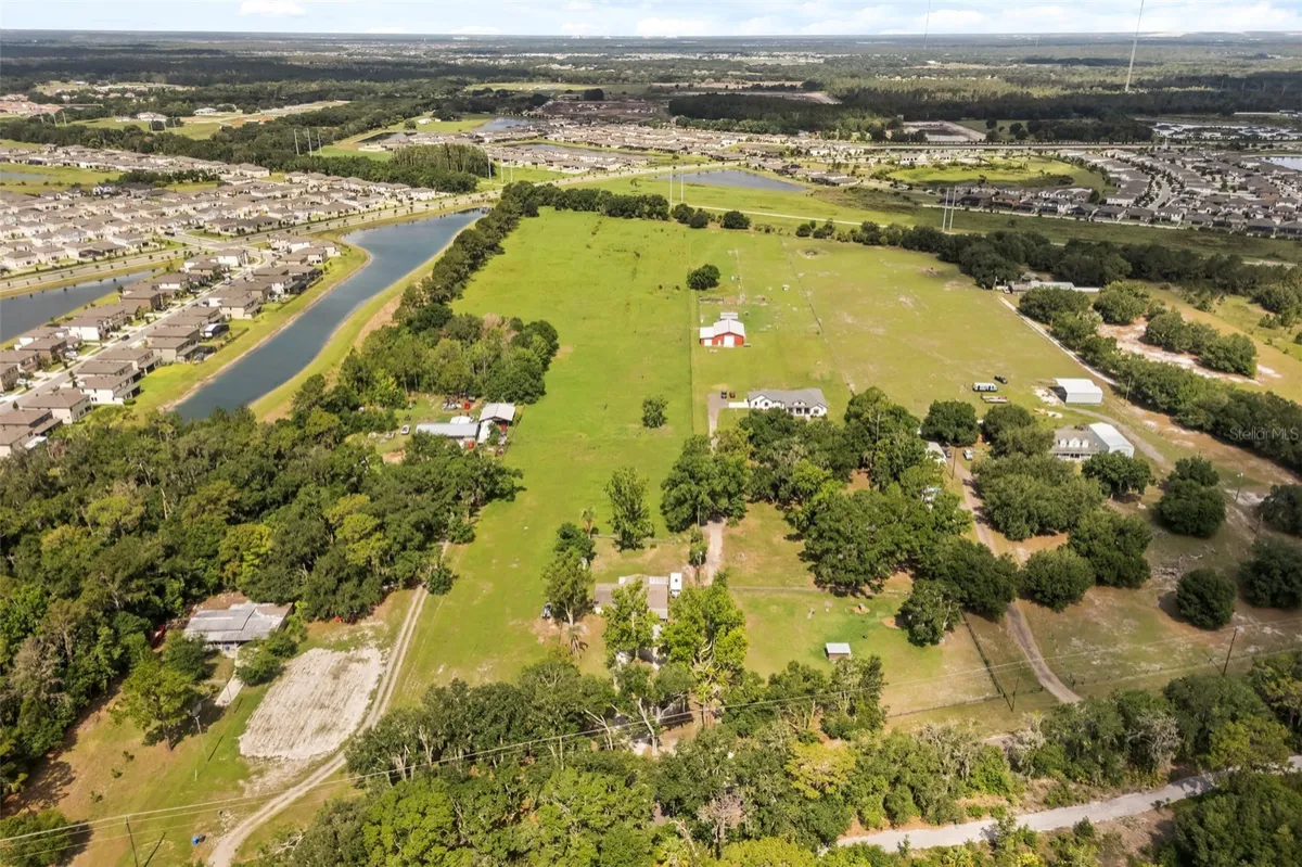 Aerial listing photograph of the Hobson Simmons Road acreage and surrounding area. Parcel boundaries must be established from the survey.
