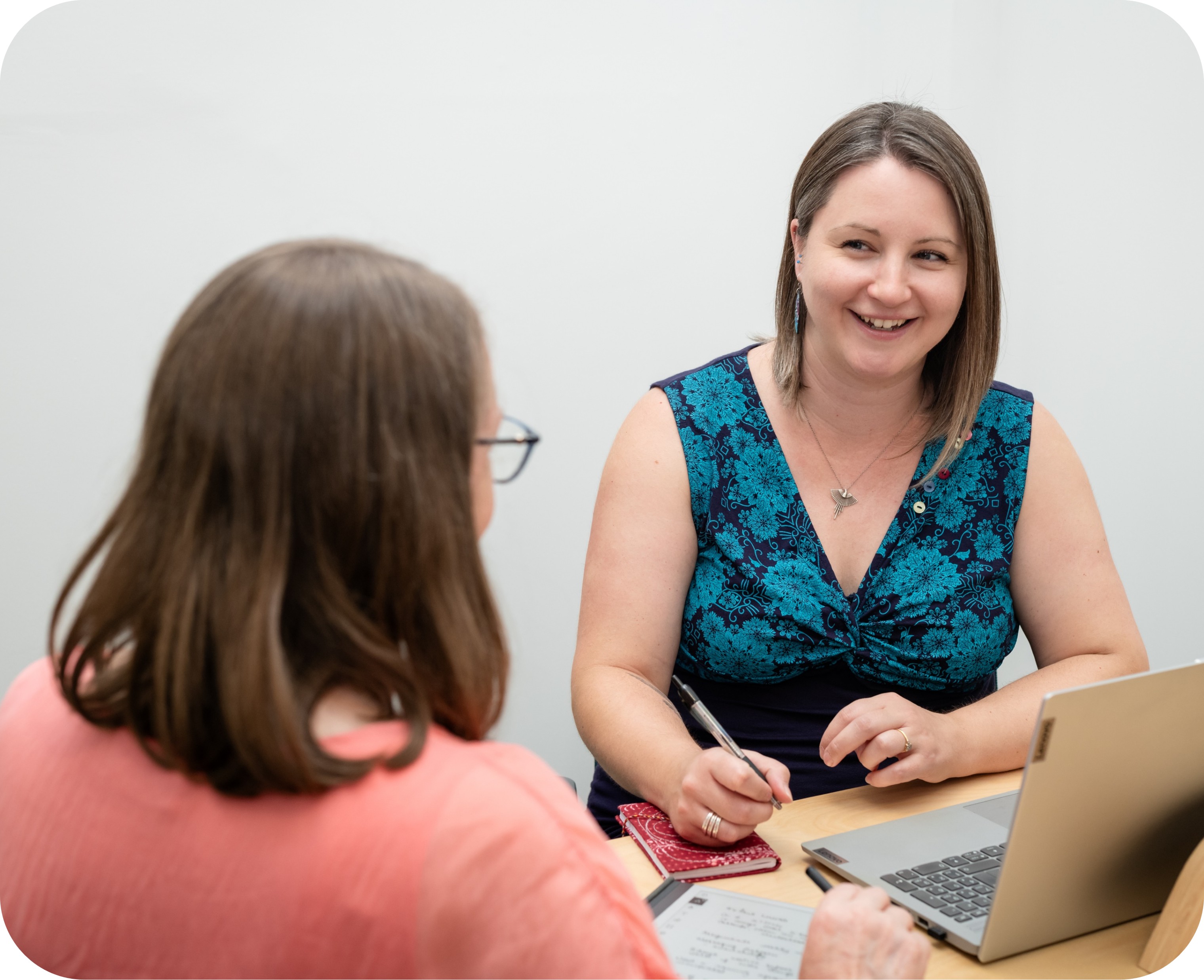 Karen and Georgie discussing document des