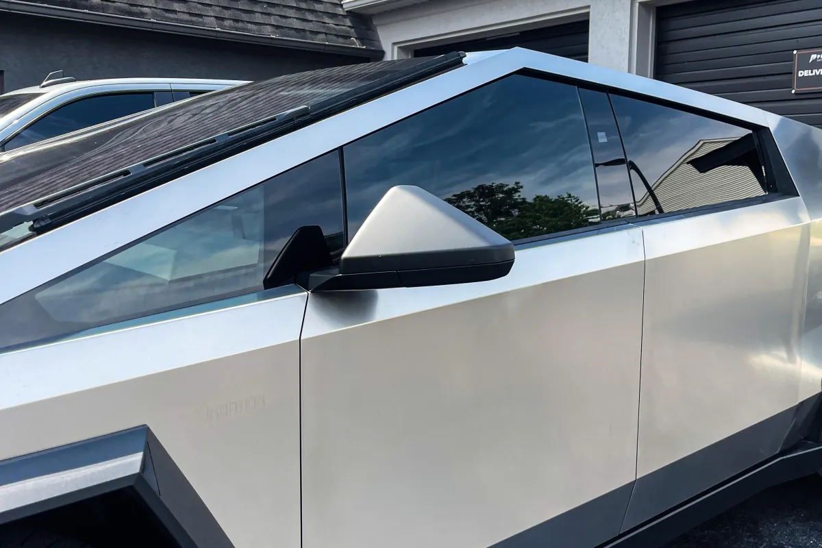 Tesla Cybertruck featuring premium carbon window tints installed at Prestige Auto Appearance. Enhance your vehicle’s style and comfort with our advanced tinting services, offering superior UV protection, glare reduction, and a sleek finish.