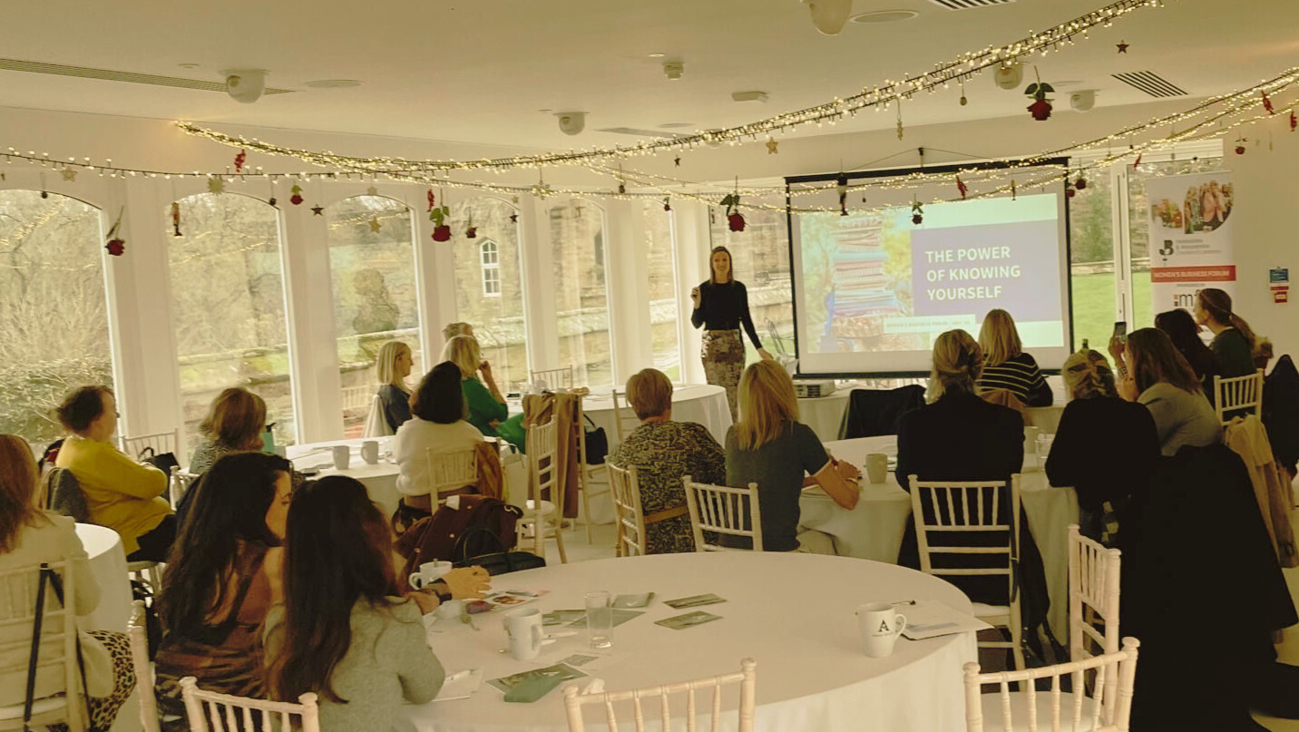 Maisie Cass delivering a keynote speech on neurodiversity and inclusion at the Women’s Business Forum.