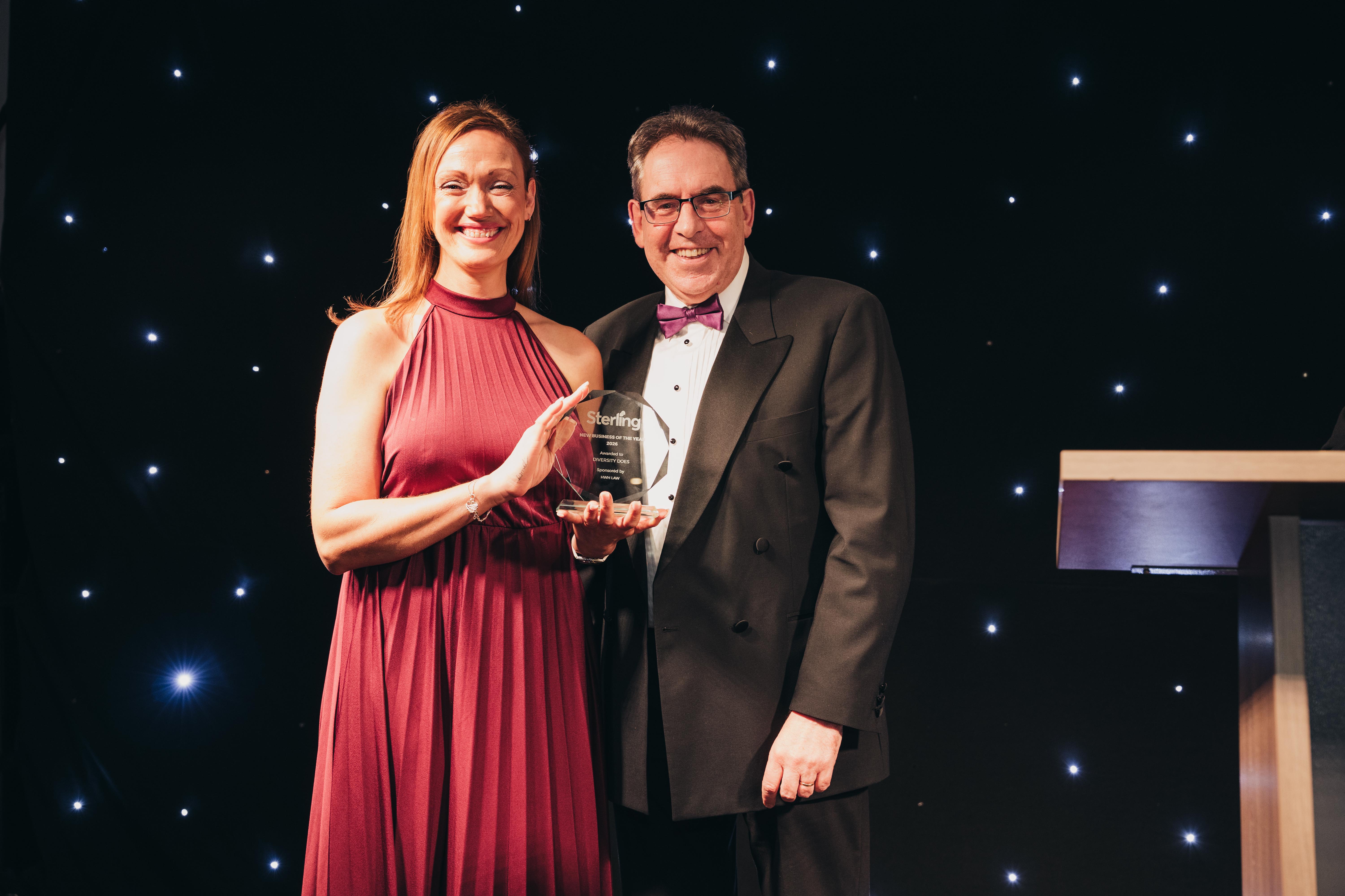 Maisie being presentd with the award for New Busiess of the Year 2026, by the award category sponsor.