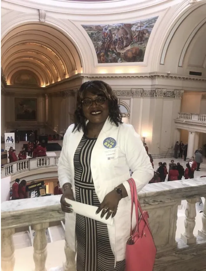 Flatlay of a notebook, lab reports, herbal supplements, and a cup of tea on a light background representing a structured functional medicine program.