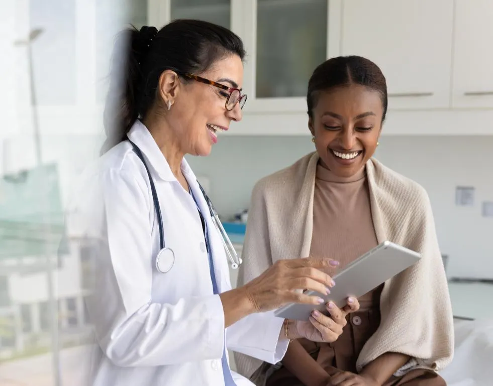 Empathetic nurse practitioner in a soft-lit, premium clinical office