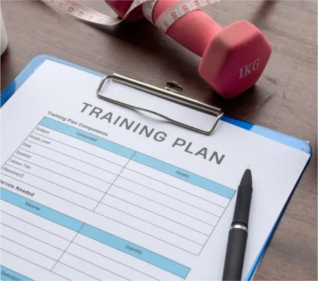 A clipboard with a Training Plan document
