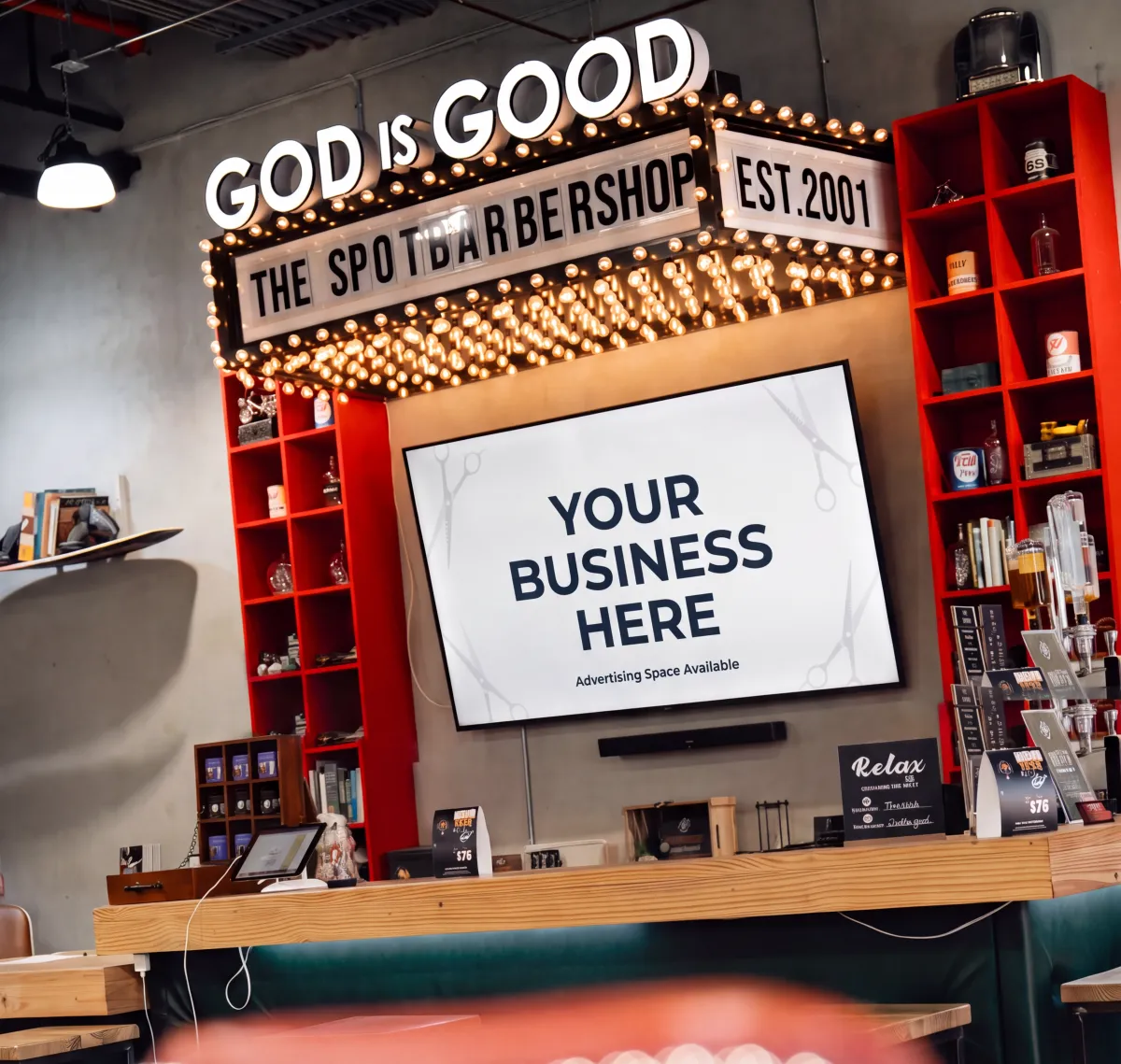 The Spot Barbershop in-shop television advertising display
