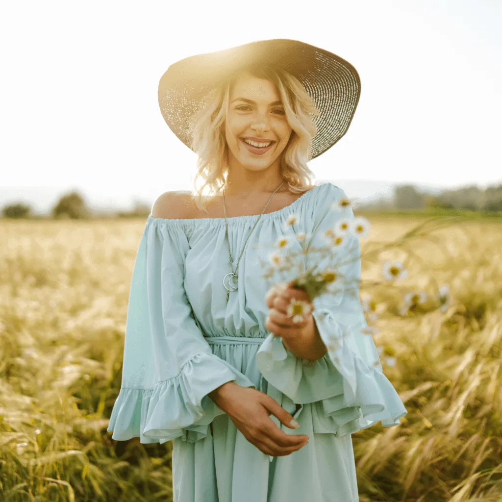 Wide landscape of a sunrise mountain ridge with a solitary walker in silhouette, 3:2 framing to communicate spaciousness and personal growth themes, crisp clarity and natural colors.