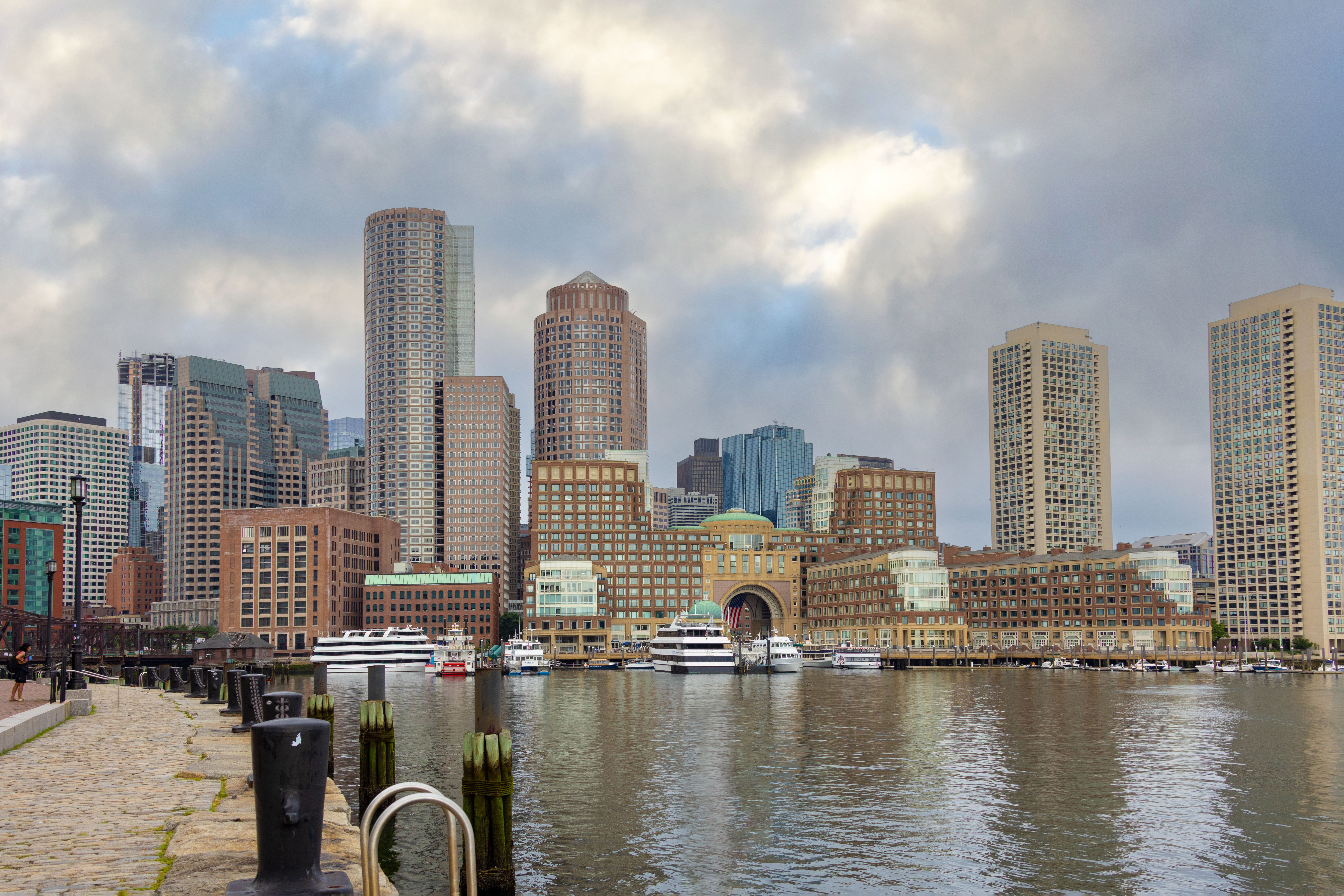 Boston Massachusetts harbor waterfront skyline representing the Greater Boston home loan market served by local mortgage specialist Sean Goudreau at Rate