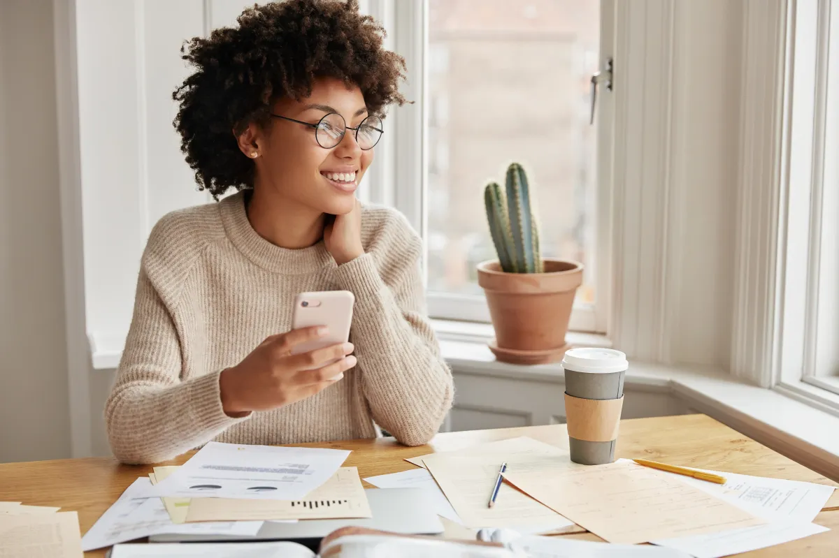 A self employed woman reviews her financials to see if she can buy a home