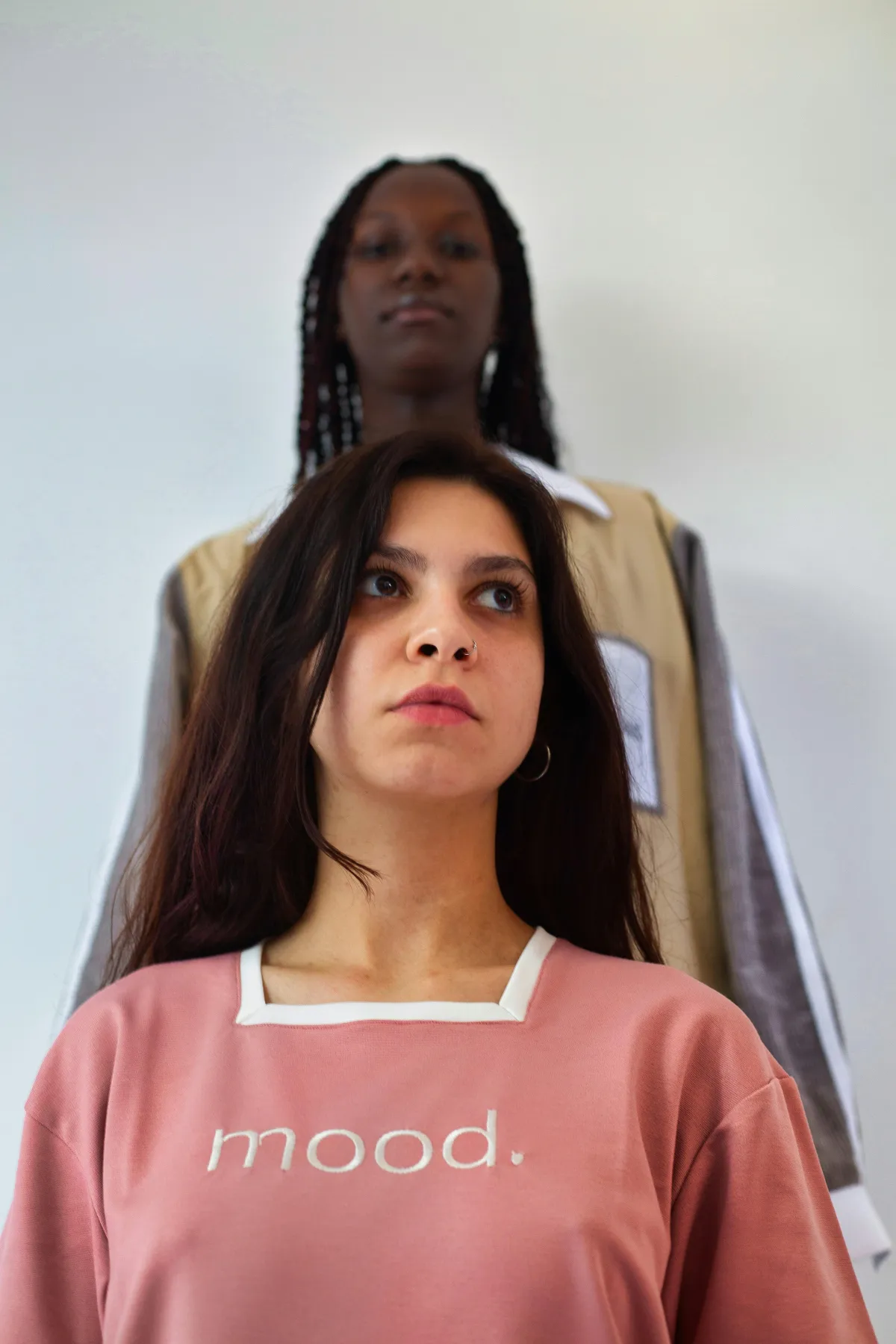 Mental health professional talking with an adult patient in a calm office setting
