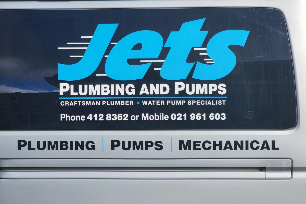 Jets Plumbing and Pumps logo in bold blue font with motion lines