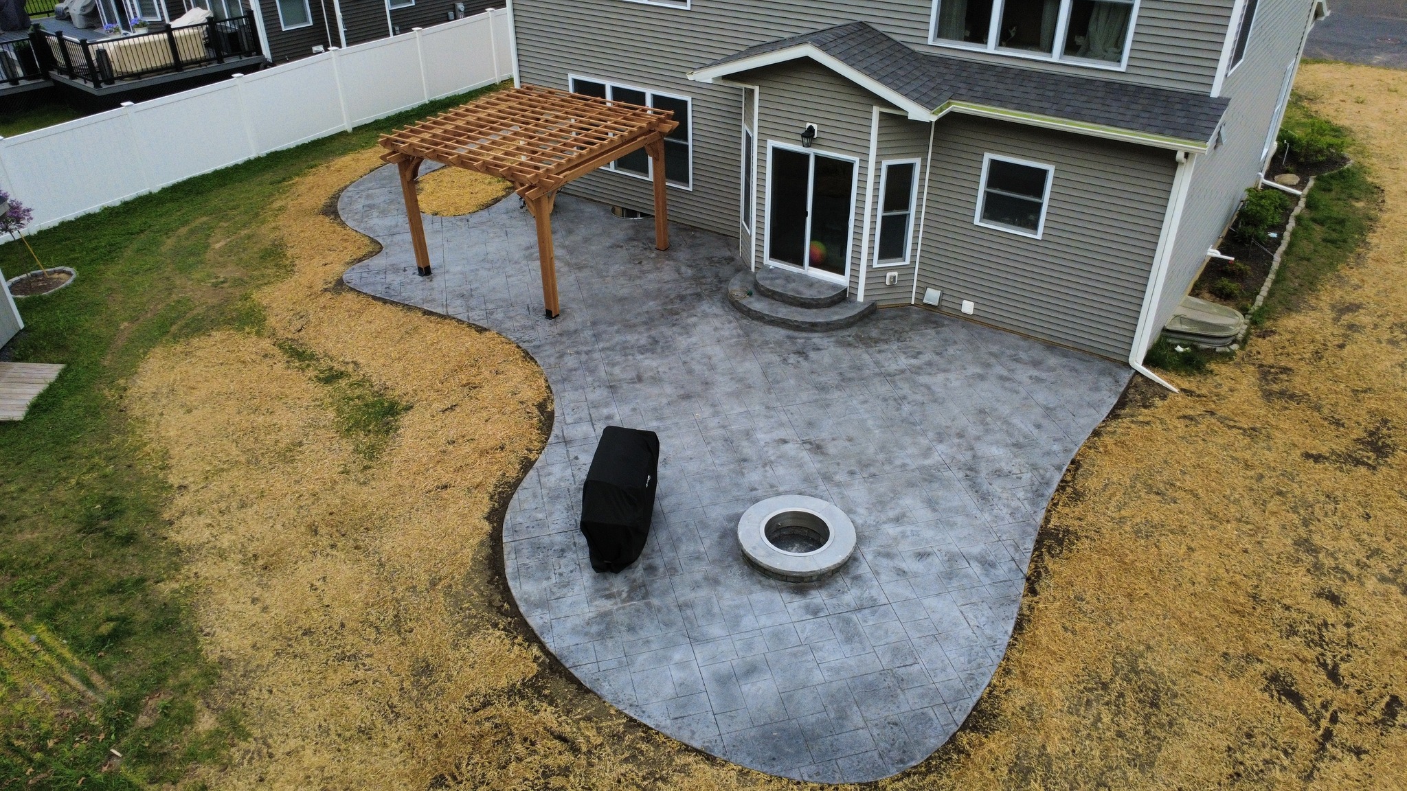 Custom concrete patio installation in North Port, FL by Concrete Anywhere