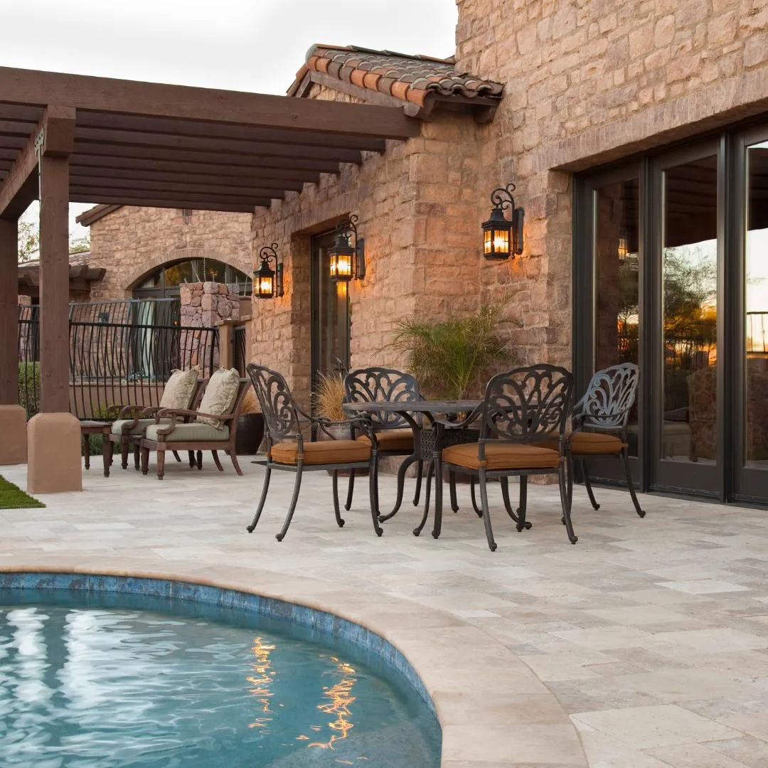 Concrete patio with in-ground pool