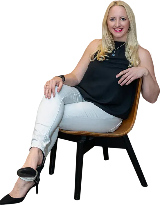 Rachael Naylor, award-winning voiceover coach and founder of The VoiceOver Network, smiling confidently in a professional recording studio