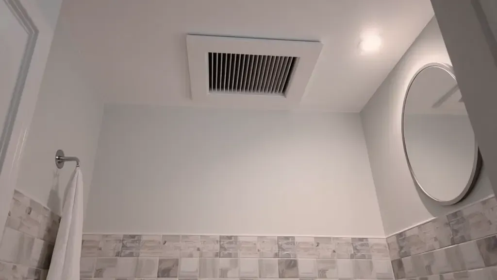 Bathroom exhaust fan installation projects in Hampstead, NC showcasing tools and step-by-step process