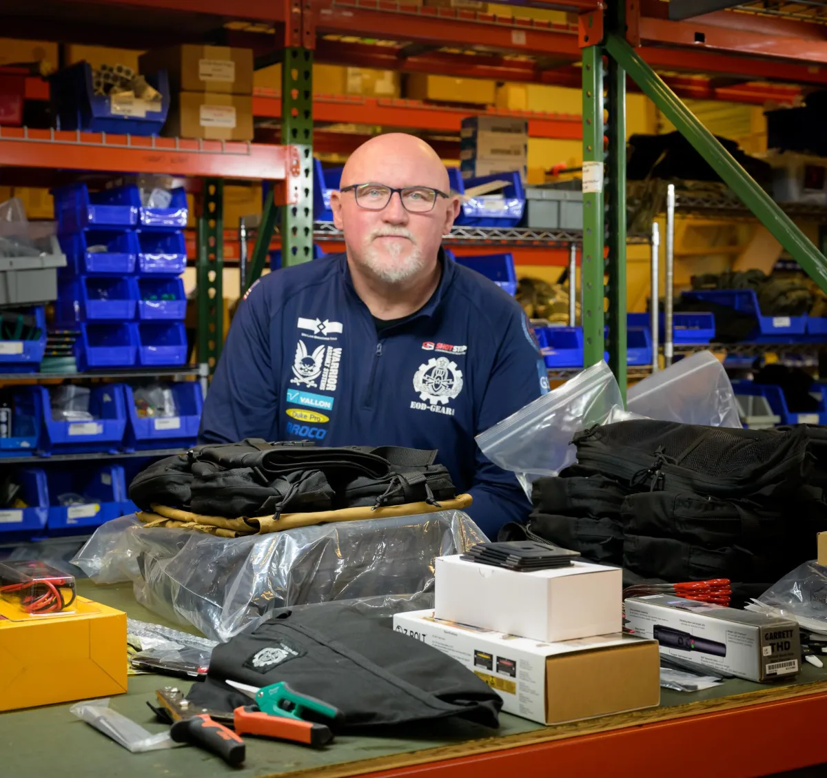 About Us - Steve Cassidy and TaQCtical Business Solutions. Steve picture in his EOD Gear Warehouse Distribution Facility in Franklin, Tennessee.