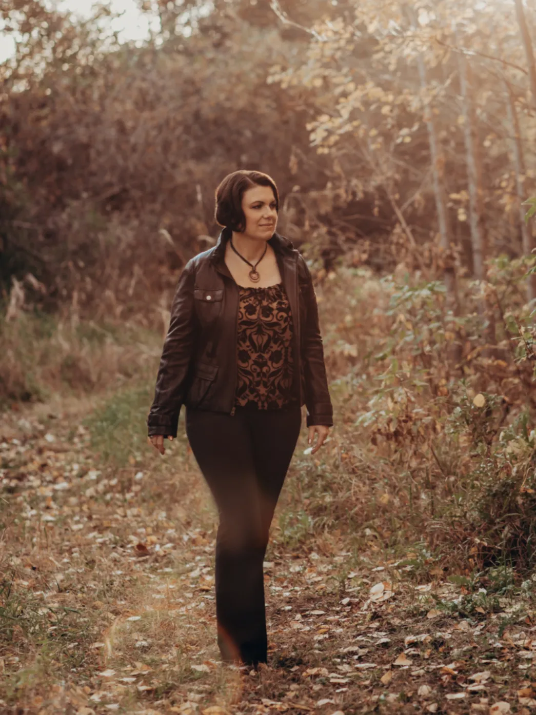 Peggy walking outdoors on a forest
