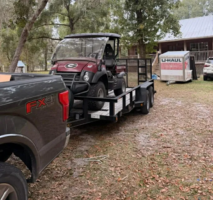 Motorcycle rider traveling, representing customers who choose our trailer rentals for reliable transport