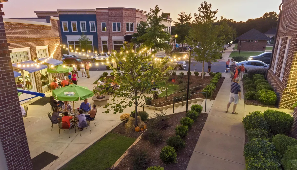 Technician repairing ceiling leak in Patrick Square home, Clemson