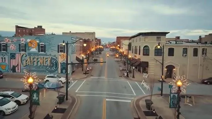 DryDoctors crew restoring water-damaged flooring in Downtown Gaffney home