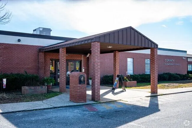 DryDoctors technician inspecting ceiling leak in Corinth neighborhood home, Gaffney