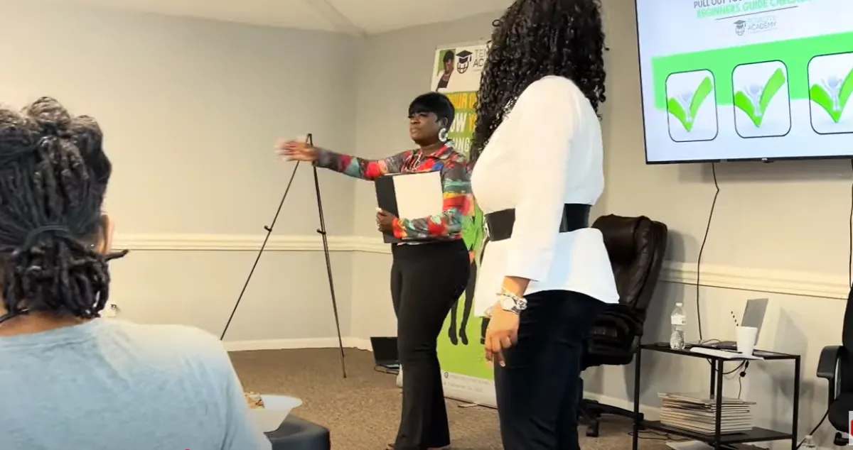 man holding incandescent bulb
