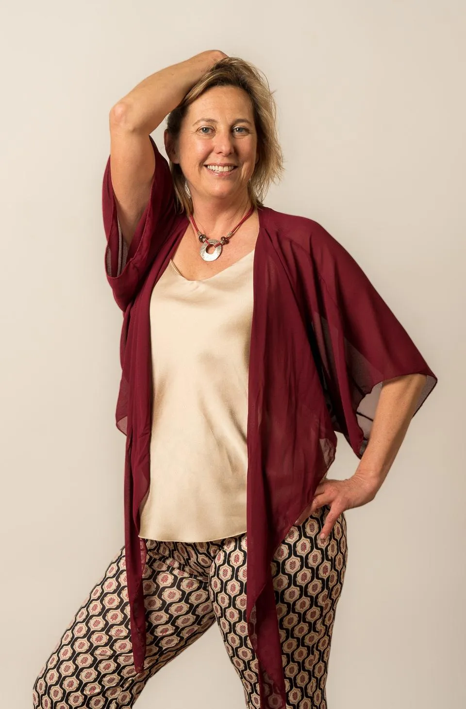 Jenn Baljko facilitating an empowering emotional embodiment workshop, helping women in their 50s, 60s, and 70s connect with their emotions through movement and self-expression.