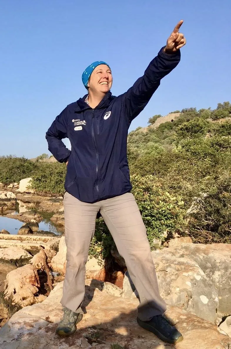 Jenn Baljko, from Always on My Way's Fierce Awakened Women mentorship program, confidently points the way amidst the beauty of nature during her hike. Symbolizing guidance and exploration, Jenn leads women towards empowerment, self-discovery, and a renewed connection with the natural world.