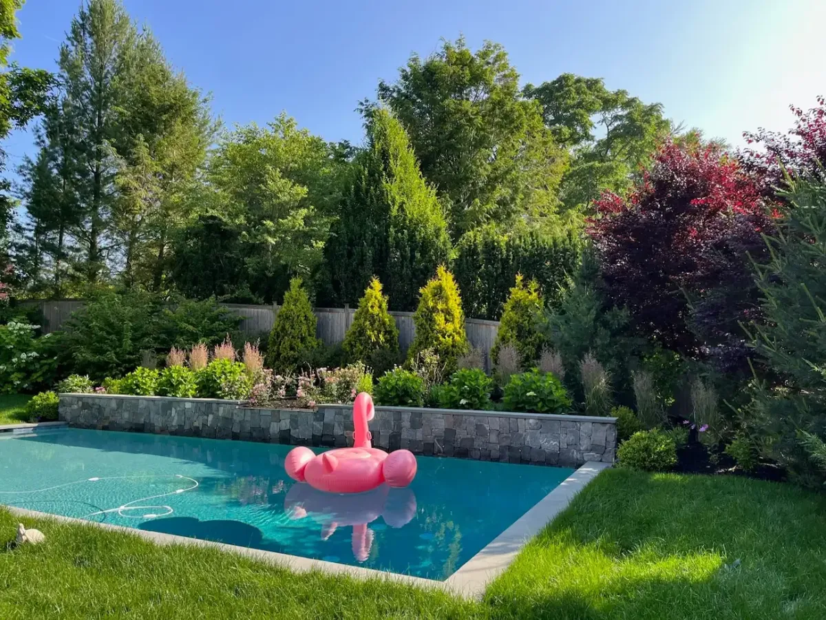 Custom soake pool spa and water feature installation in Marblehead MA with oceanfront harbor sunset views.