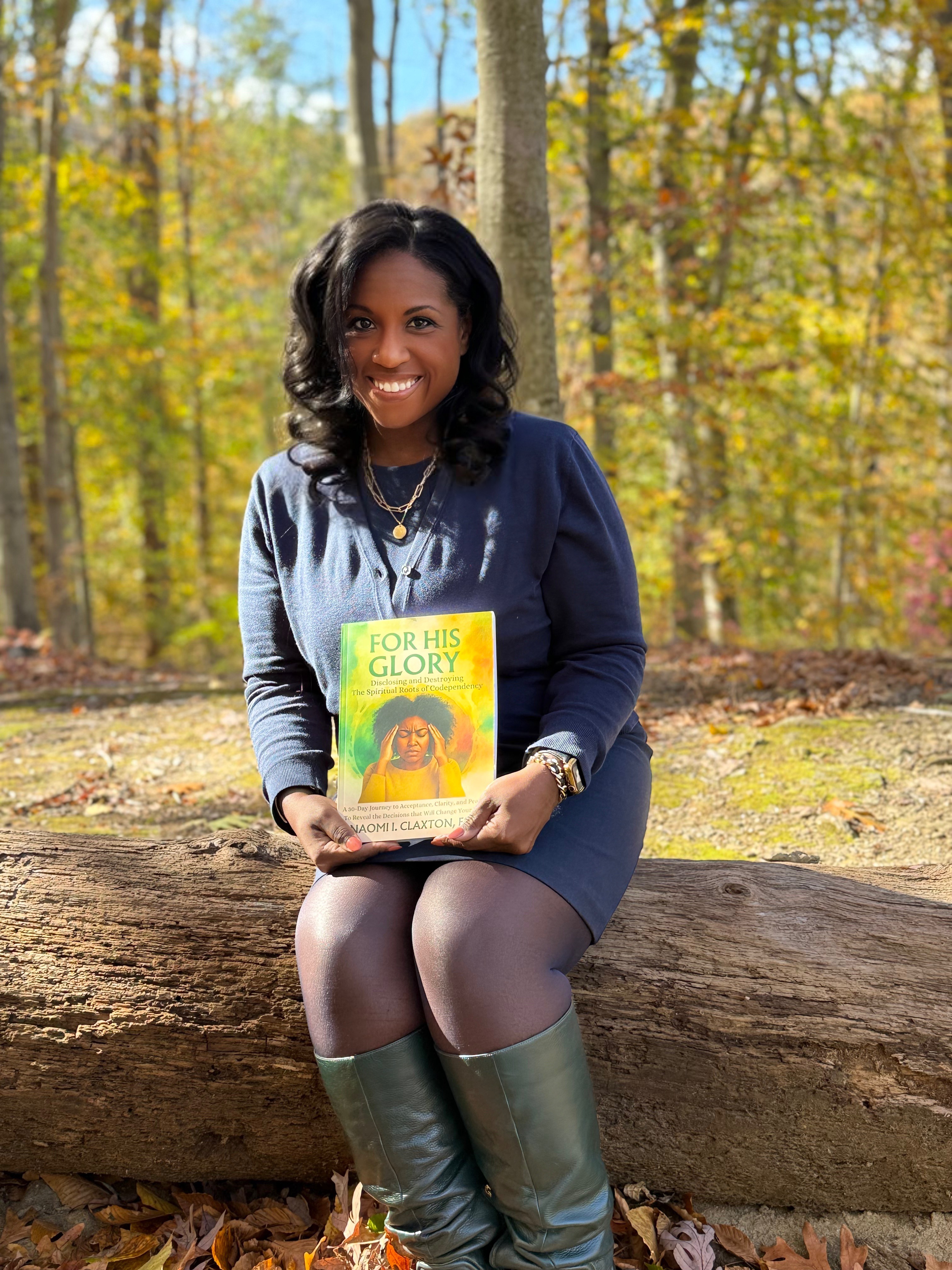 grayscale photo of 3 women sitting on wooden bench