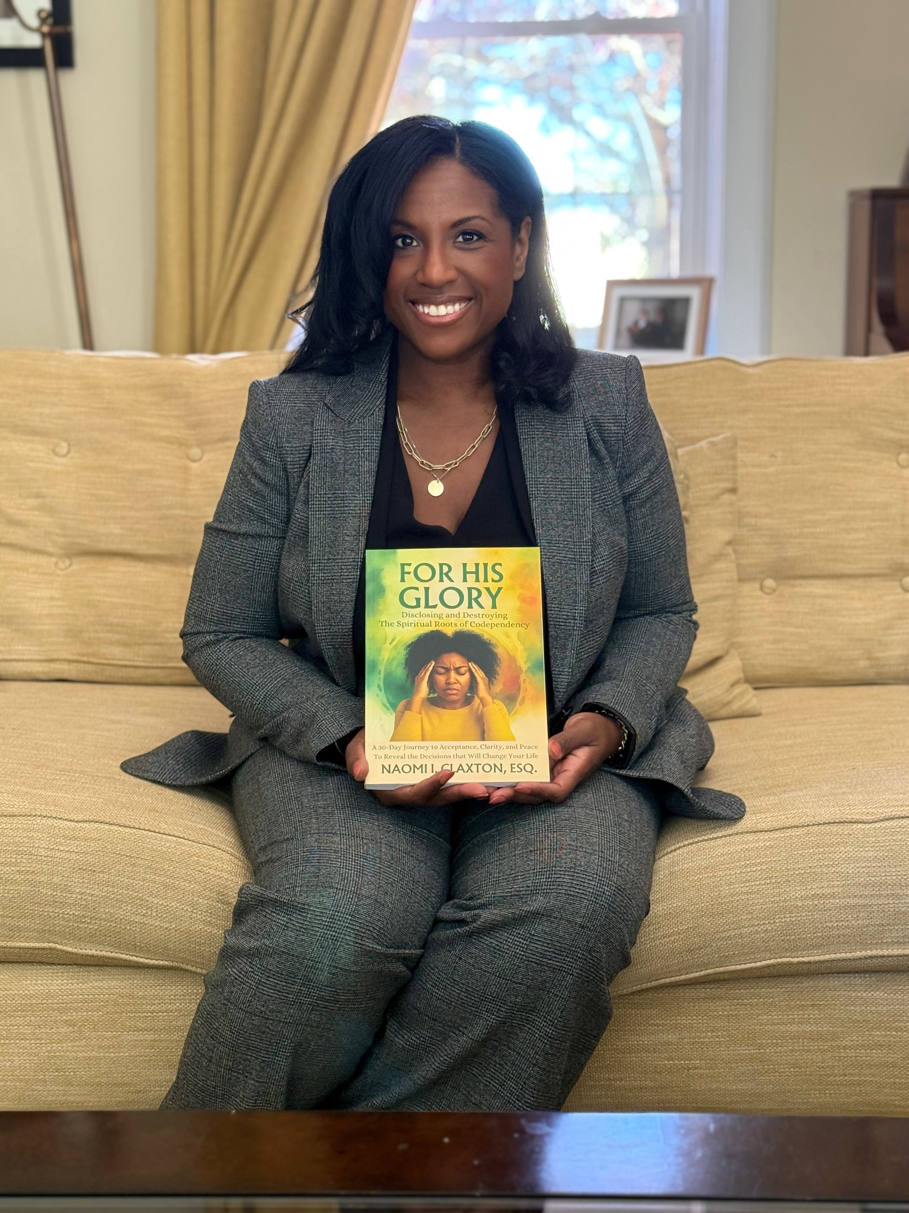 grayscale photo of 3 women sitting on wooden bench