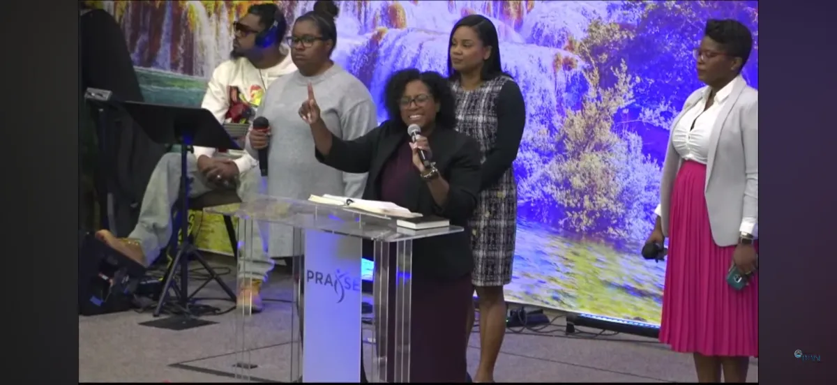 a person holding a sign that says new empowering stories