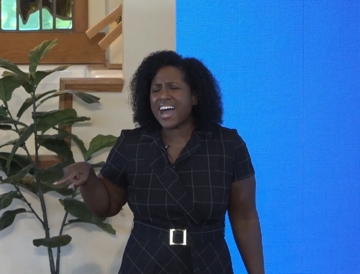 a person holding a sign that says new empowering stories