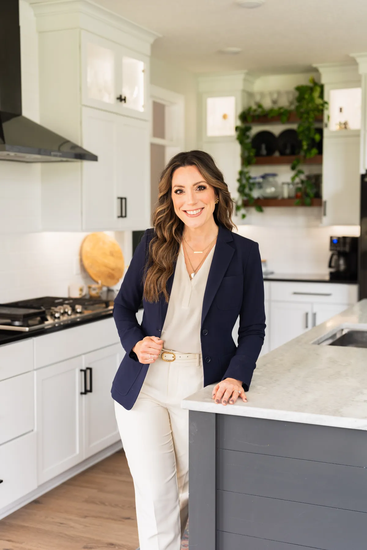 Stephanie standing warmly in a well-lit living room, exuding compassion and approachability