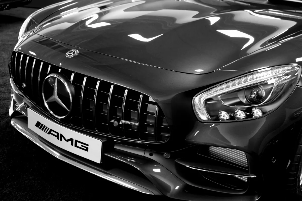 a close up of a car parked on a street