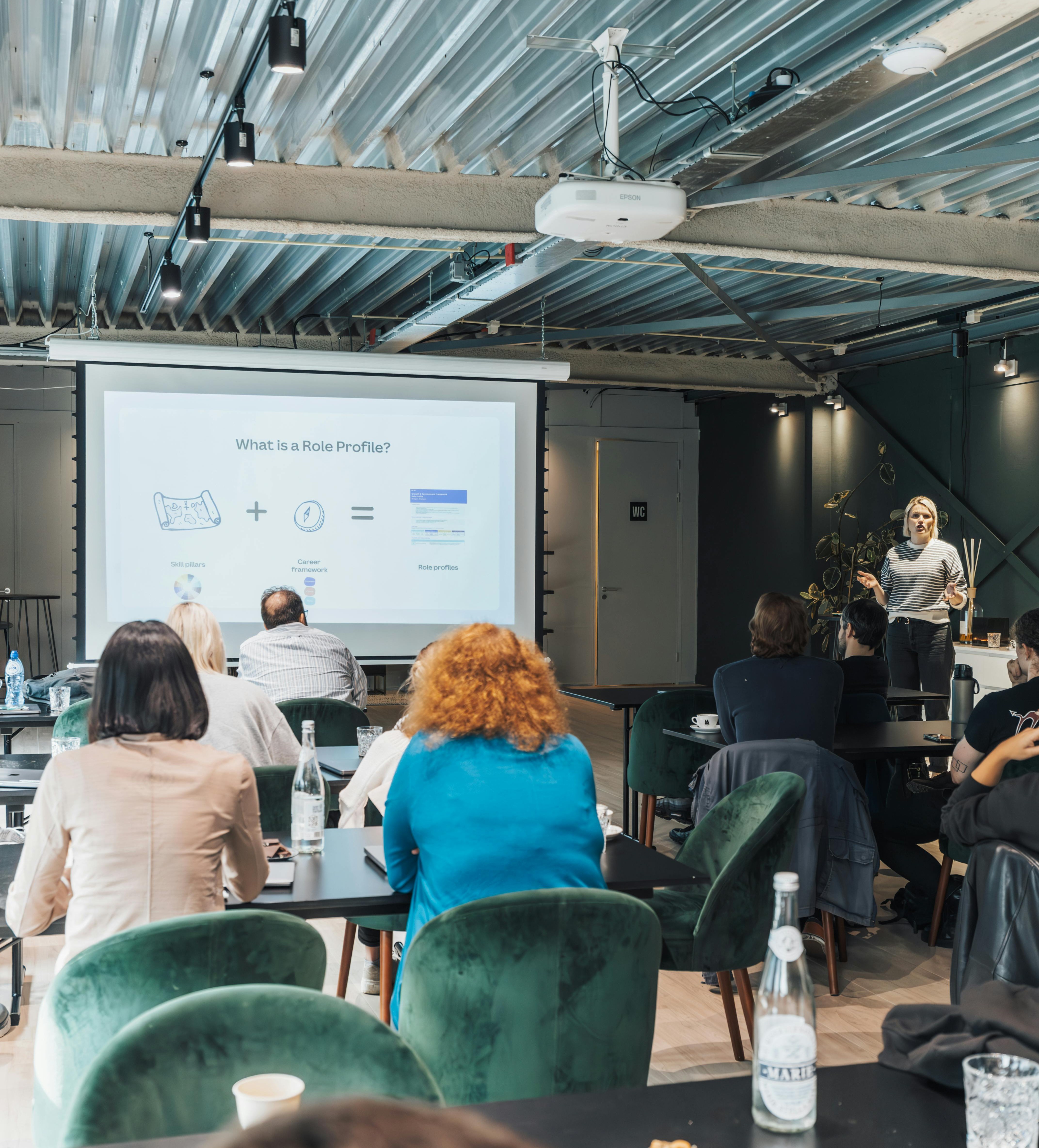 Coaching session in glass office